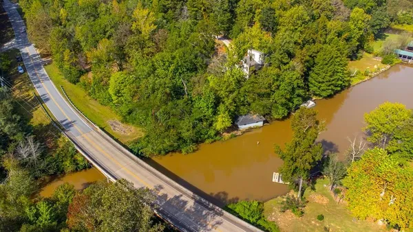 a view of swimming pool from a balcony