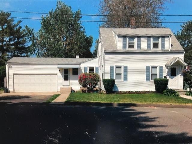 23 Alberta Street Waterbury, CT 06708 - Photo 1 of 1 a front view of a house with a garden and yard