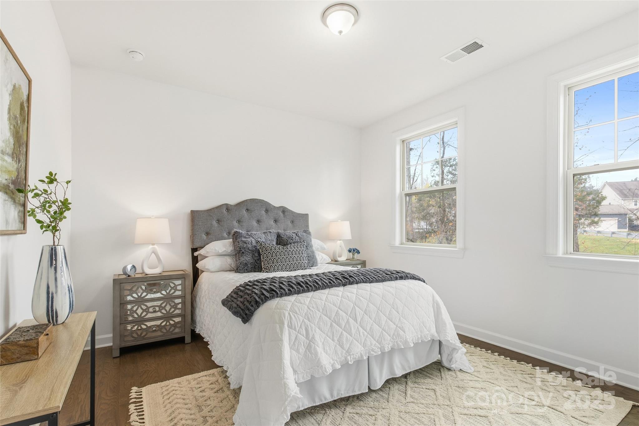 16714 Setter Point Lane Davidson, NC 28036 - Photo 14 of 29 a bedroom with a bed and a window
