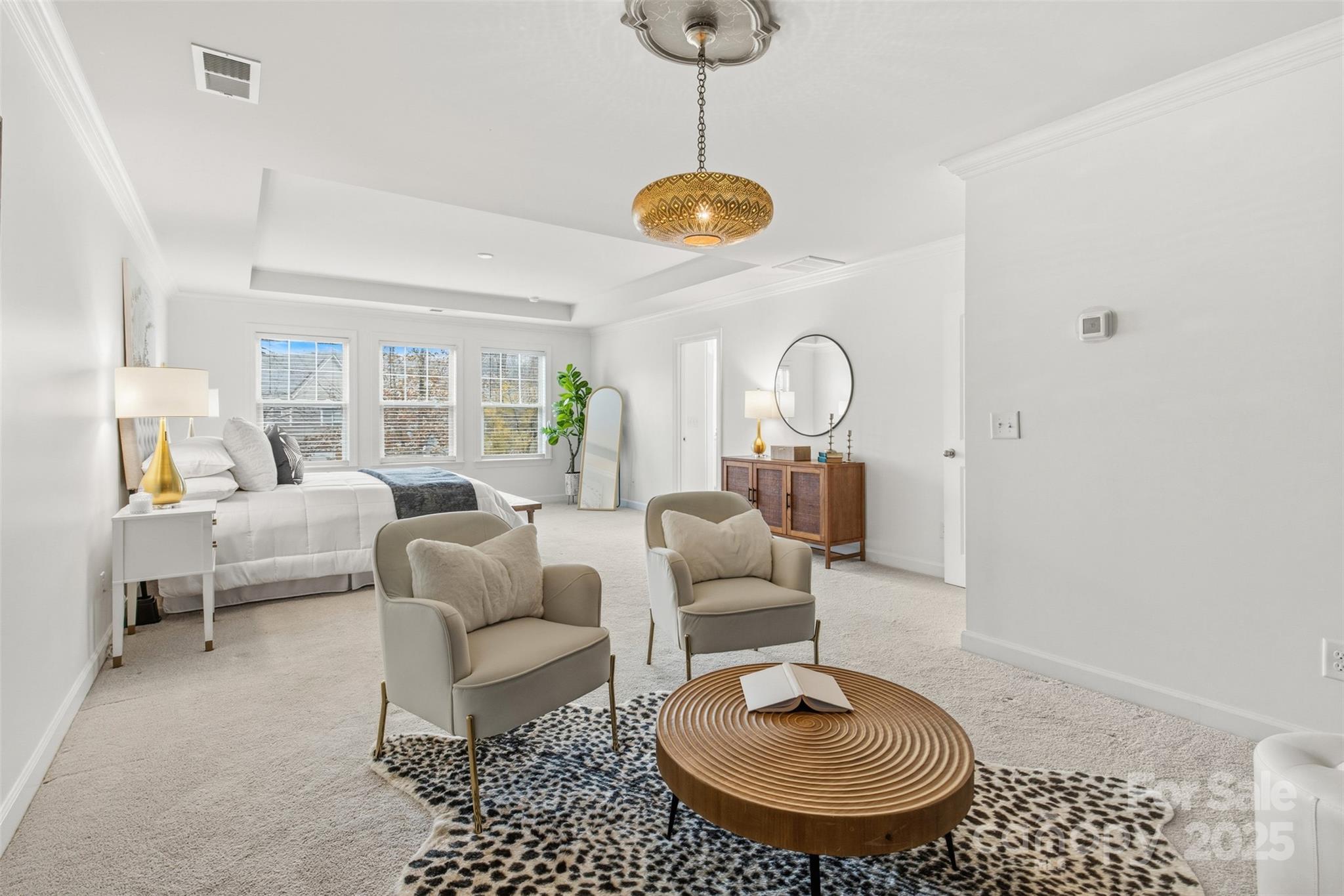 16714 Setter Point Lane Davidson, NC 28036 - Photo 19 of 29 a living room with furniture a chandelier and a window