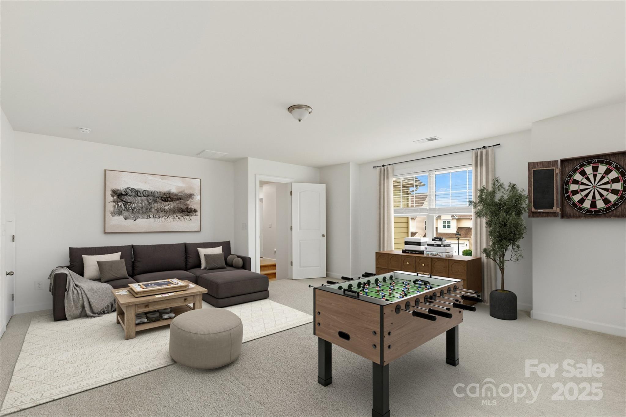 16714 Setter Point Lane Davidson, NC 28036 - Photo 21 of 29 a living room with furniture and a window