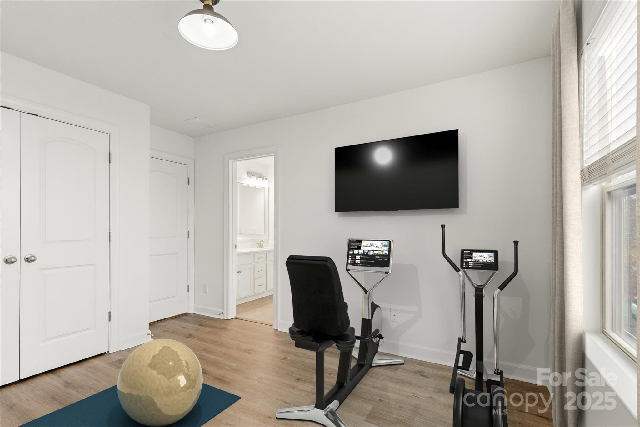 16714 Setter Point Lane Davidson, NC 28036 - Photo 22 of 29 a view of a livingroom with furniture and a flat screen tv