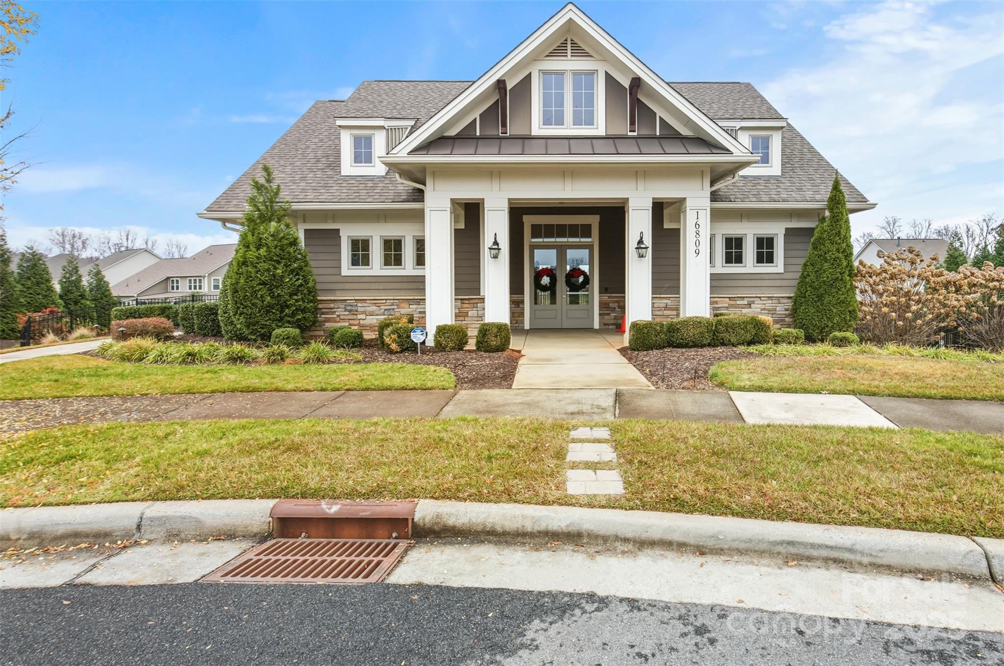 16714 Setter Point Lane Davidson, NC 28036 - Photo 26 of 29 a front view of a house with a yard
