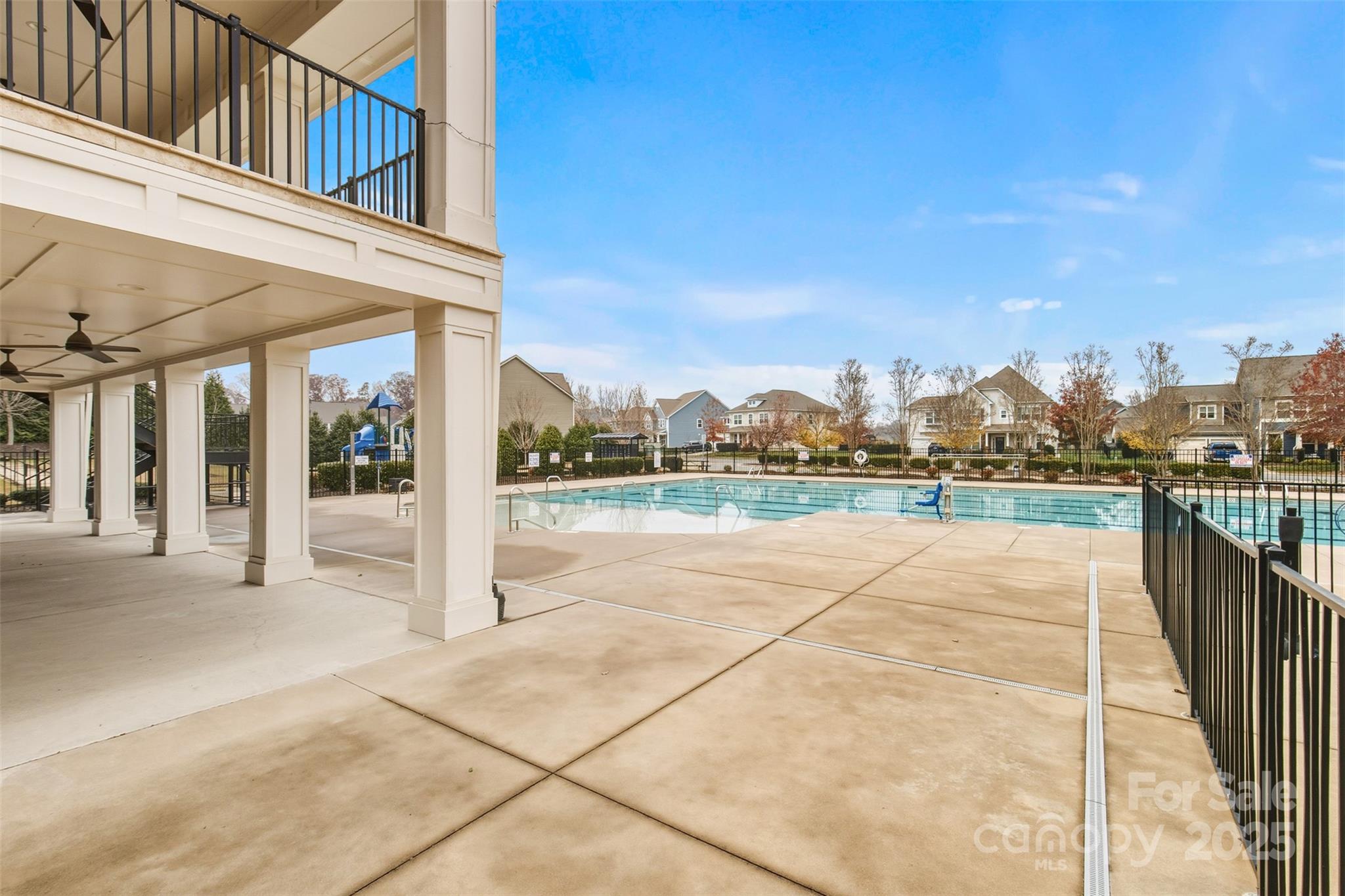 16714 Setter Point Lane Davidson, NC 28036 - Photo 27 of 29 a view of swimming pool with outdoor seating and city view