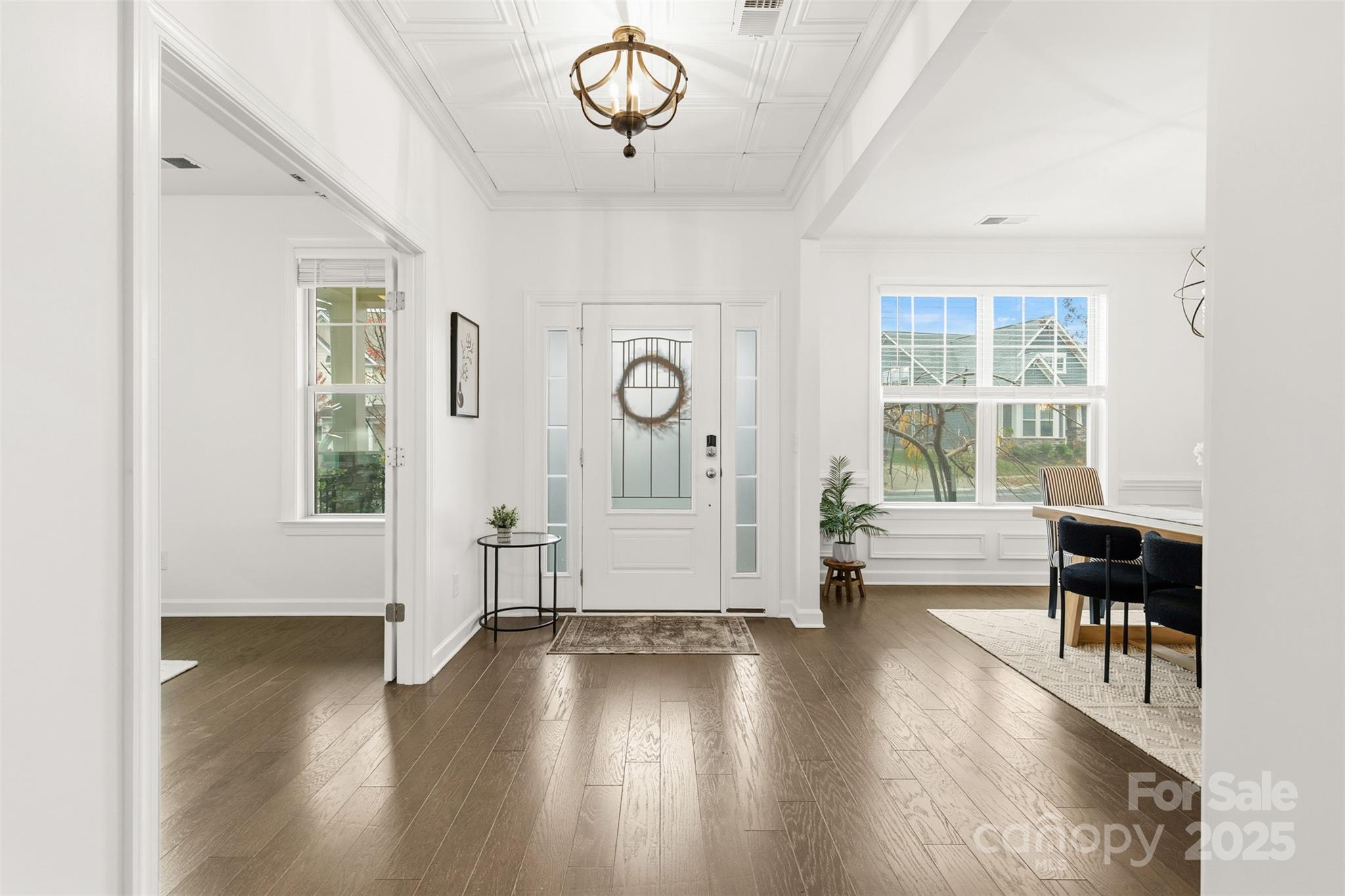 16714 Setter Point Lane Davidson, NC 28036 - Photo 3 of 29 a view of livingroom with furniture wooden floor and windows