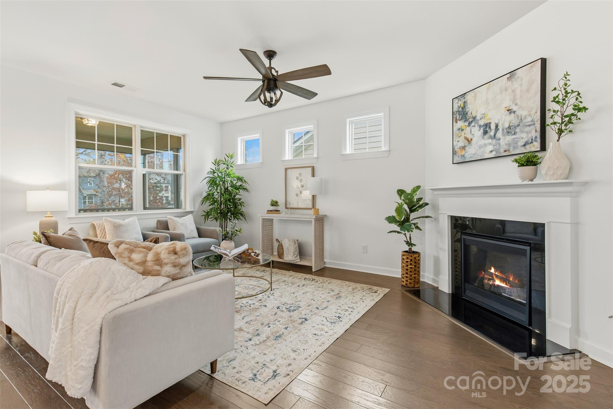 16714 Setter Point Lane Davidson, NC 28036 - Photo 8 of 29 a living room with furniture and a fireplace