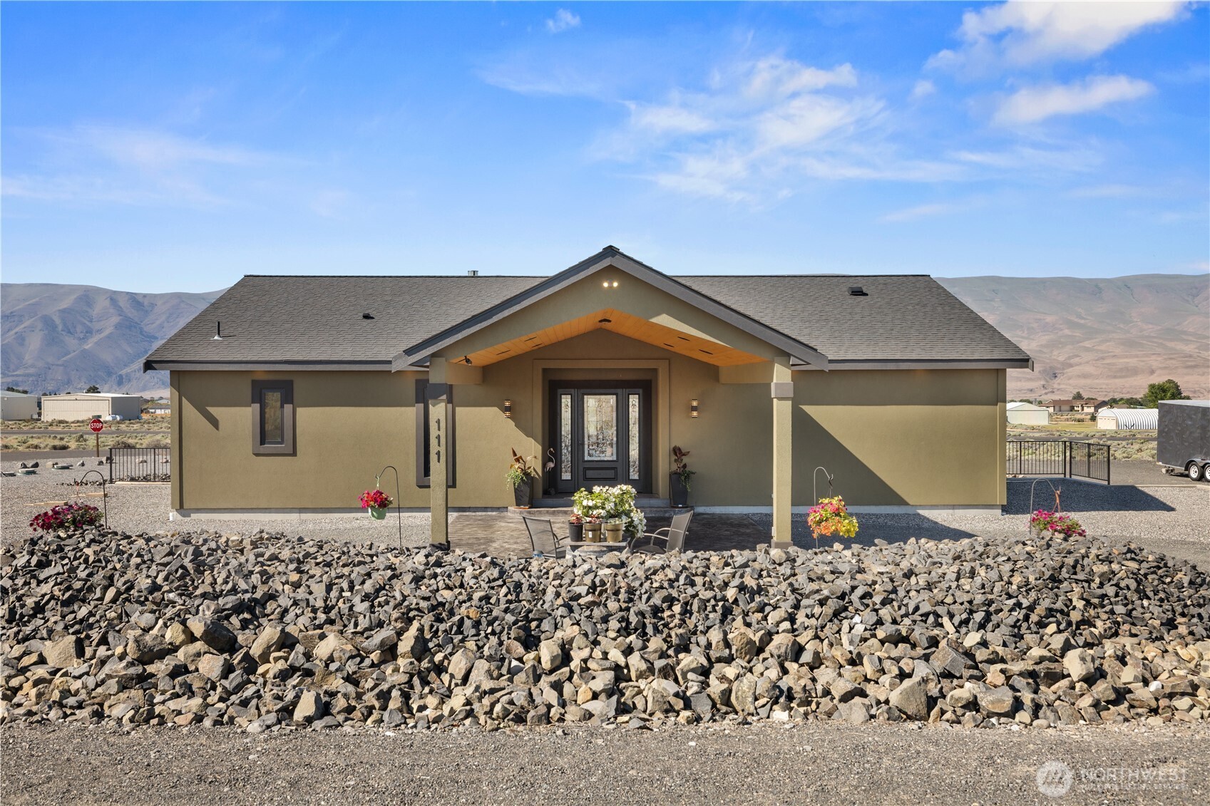 111 Wren Loop Southwest Mattawa, WA 99349 - Photo 37 of 40 front view of house with a yard