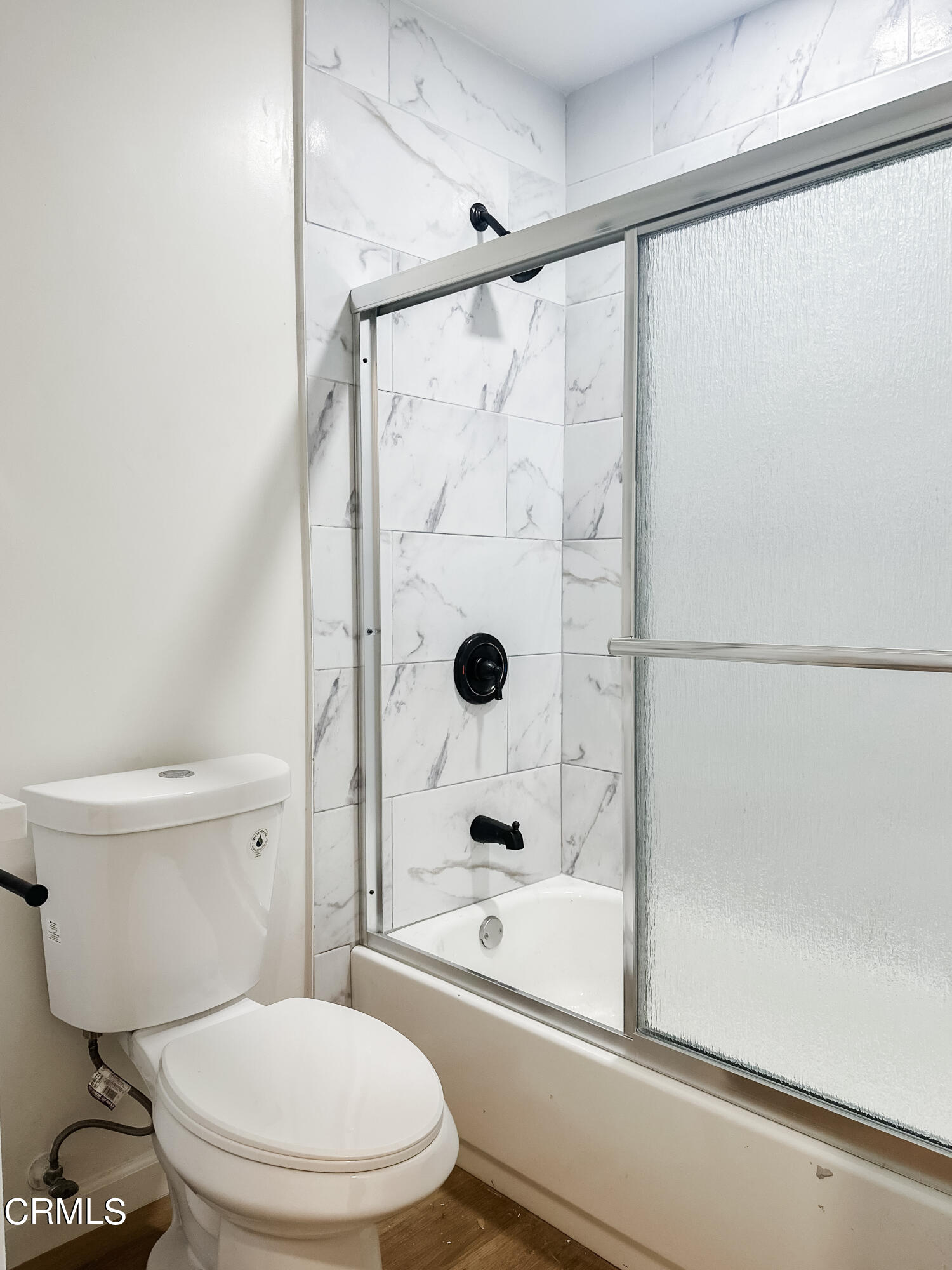 1805 MacArthur Place Oxnard, CA 93033 - Photo 17 of 23 a bathroom with a toilet and a shower