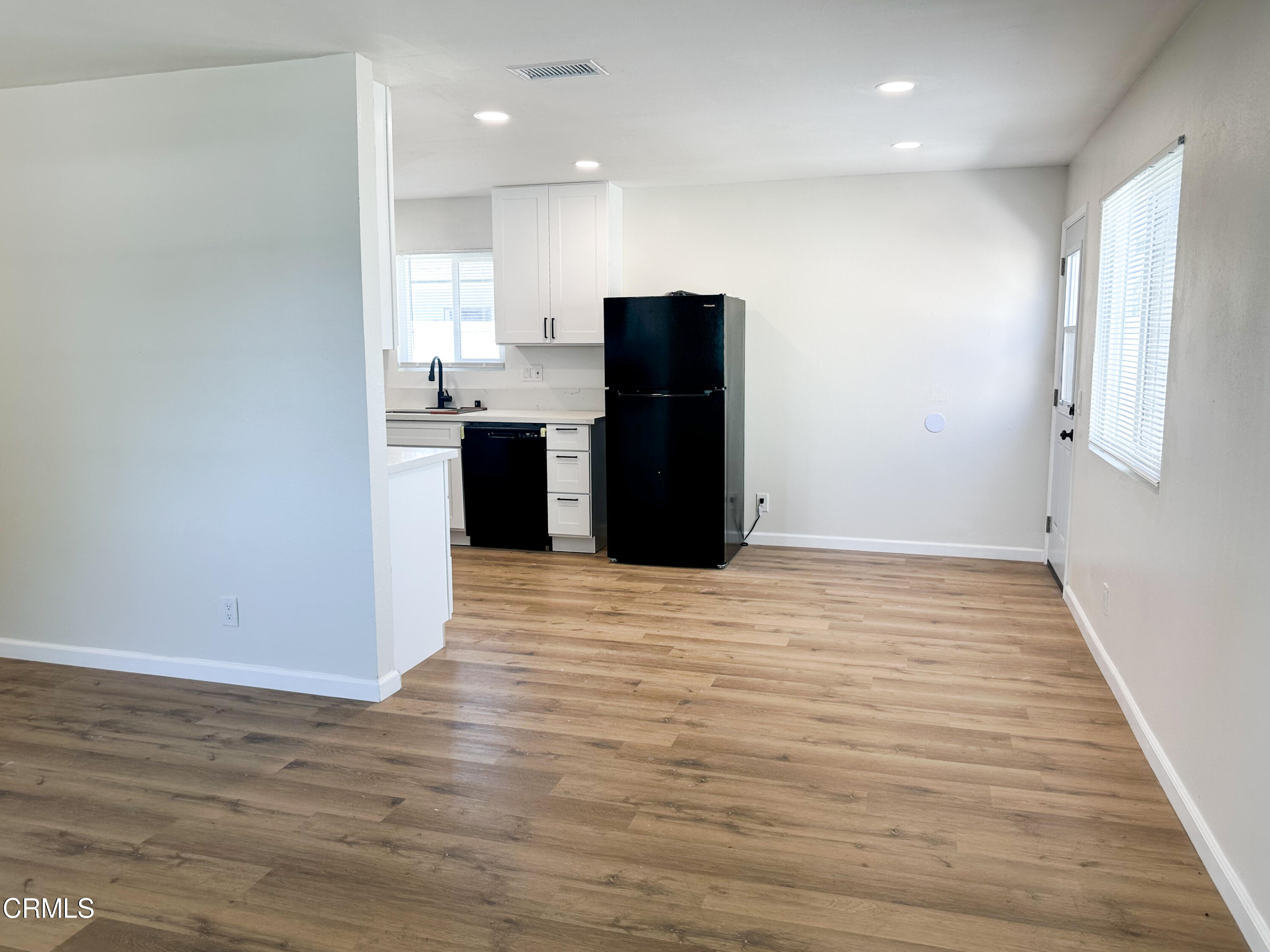 1805 MacArthur Place Oxnard, CA 93033 - Photo 10 of 23 a view of kitchen with refrigerator and window