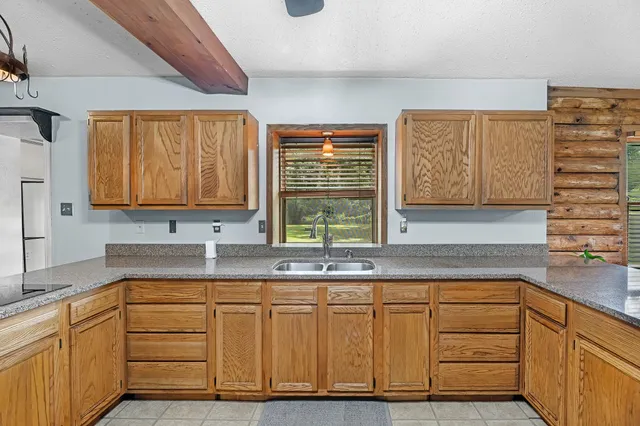 a bedroom with a bed and a table