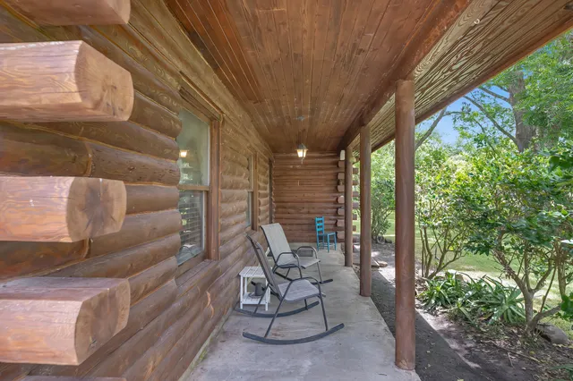 a kitchen with granite countertop a sink and a window