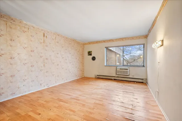 $215,000 | 6800 North California Avenue, Unit 4H, Chicago, IL 60645