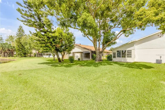 a view of a swimming pool with a garden