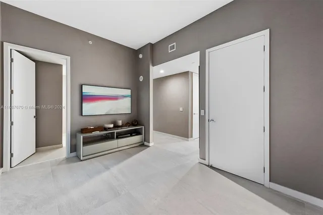 an aerial view of a house with a swimming pool