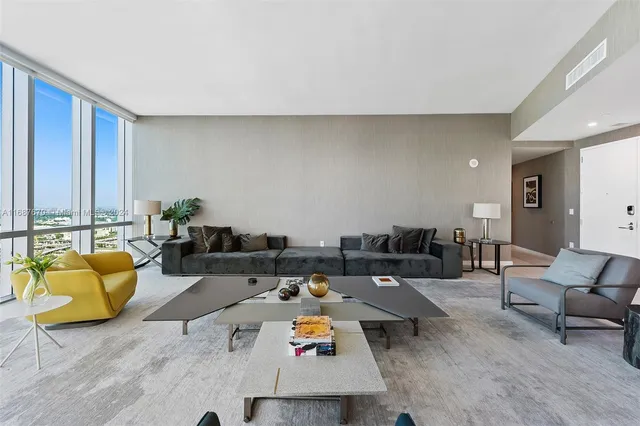 a living room with furniture and rug