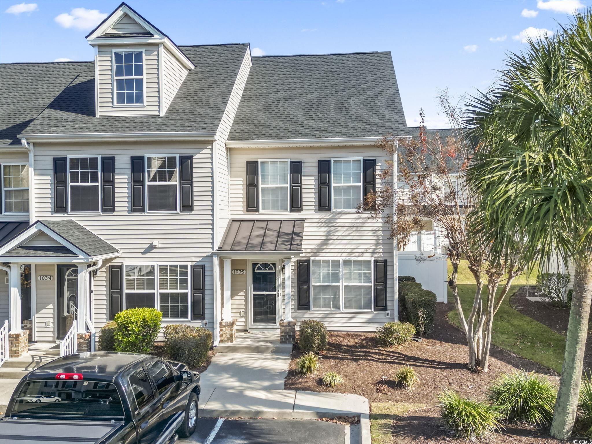 103 Barnacle Lane, Unit R5 Little River, SC 29566 - Photo 1 of 33 View of front of house featuring a shingled roof and uncovered parking