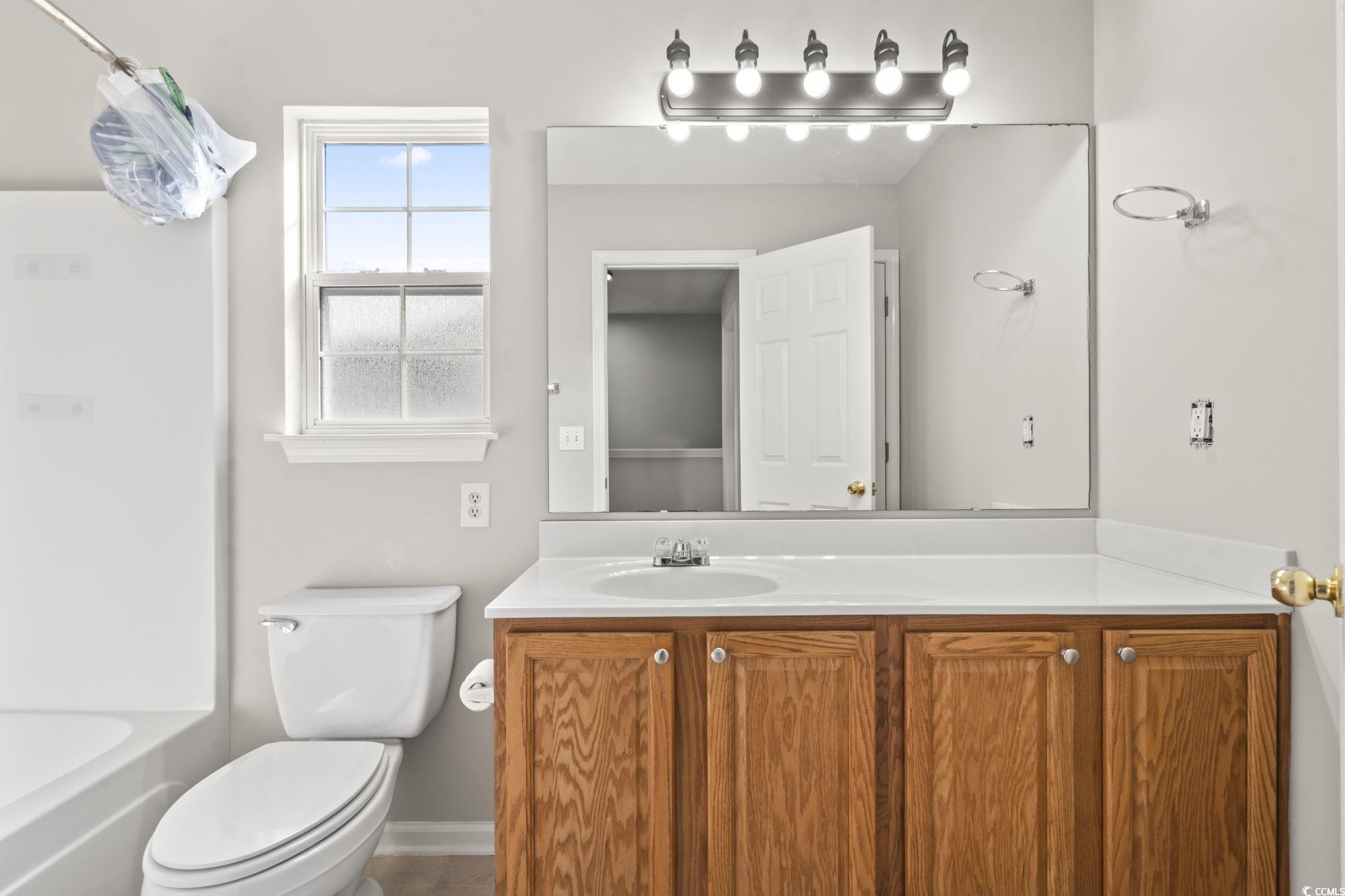 103 Barnacle Lane, Unit R5 Little River, SC 29566 - Photo 19 of 33 Full bath featuring vanity and shower / bathtub combination
