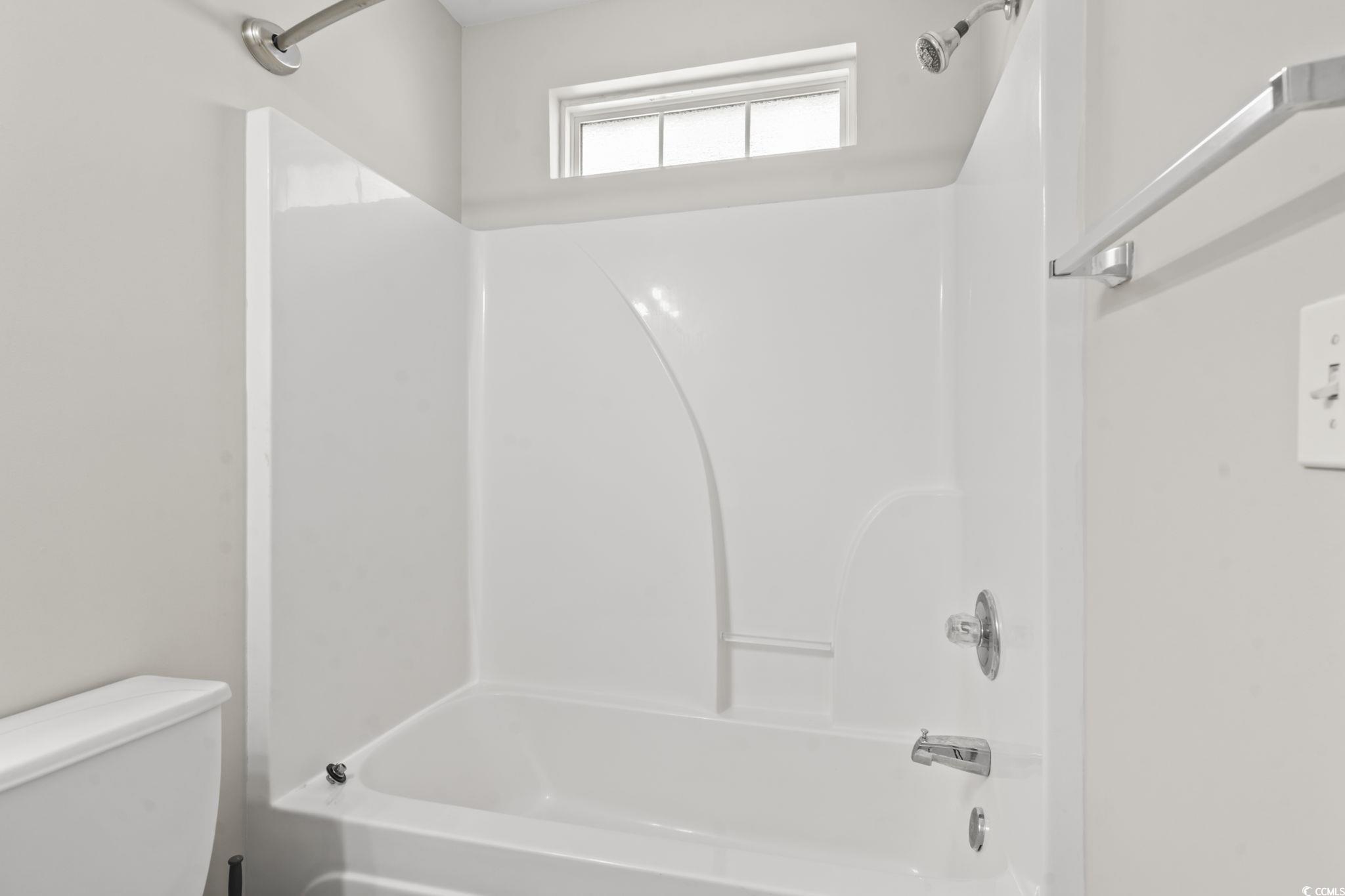 103 Barnacle Lane, Unit R5 Little River, SC 29566 - Photo 28 of 33 Full bath with shower / washtub combination and toilet