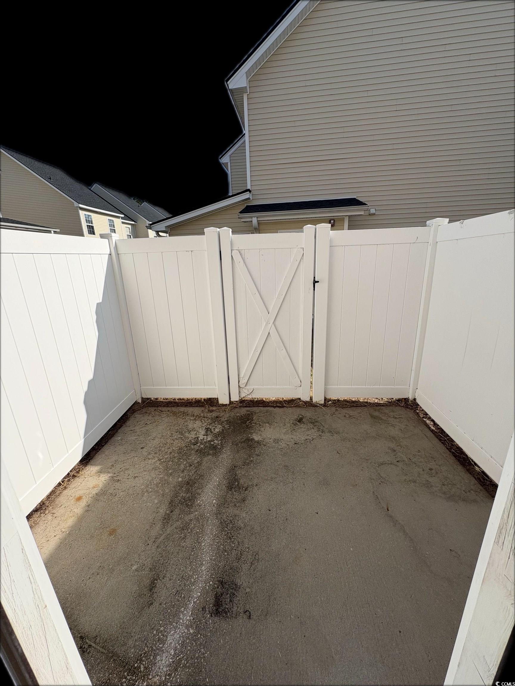 103 Barnacle Lane, Unit R5 Little River, SC 29566 - Photo 29 of 33 View of patio / terrace featuring a gate