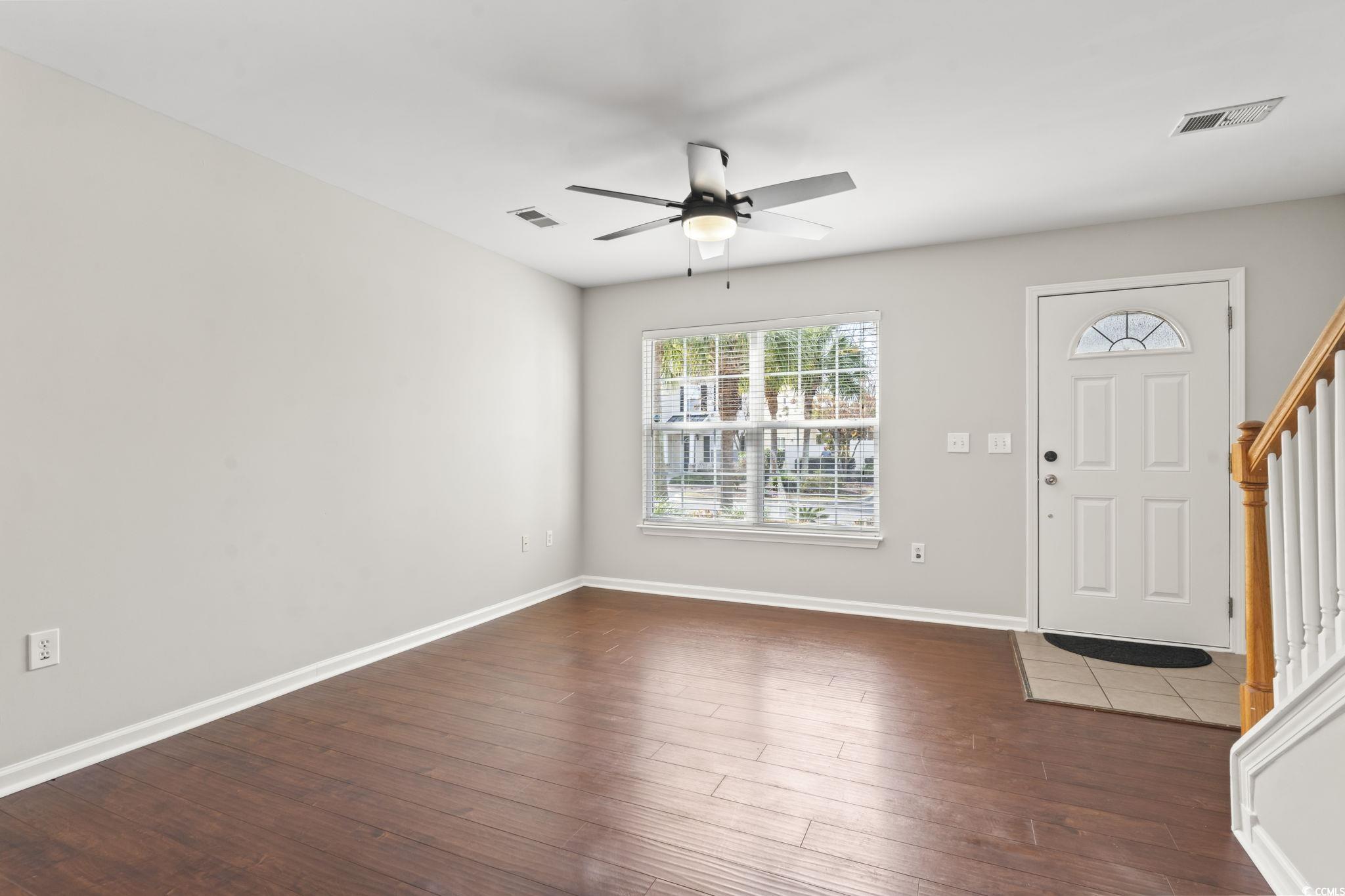 103 Barnacle Lane, Unit R5 Little River, SC 29566 - Photo 6 of 33 Foyer entrance featuring stairway, dark wood-style flooring, and ceiling fan