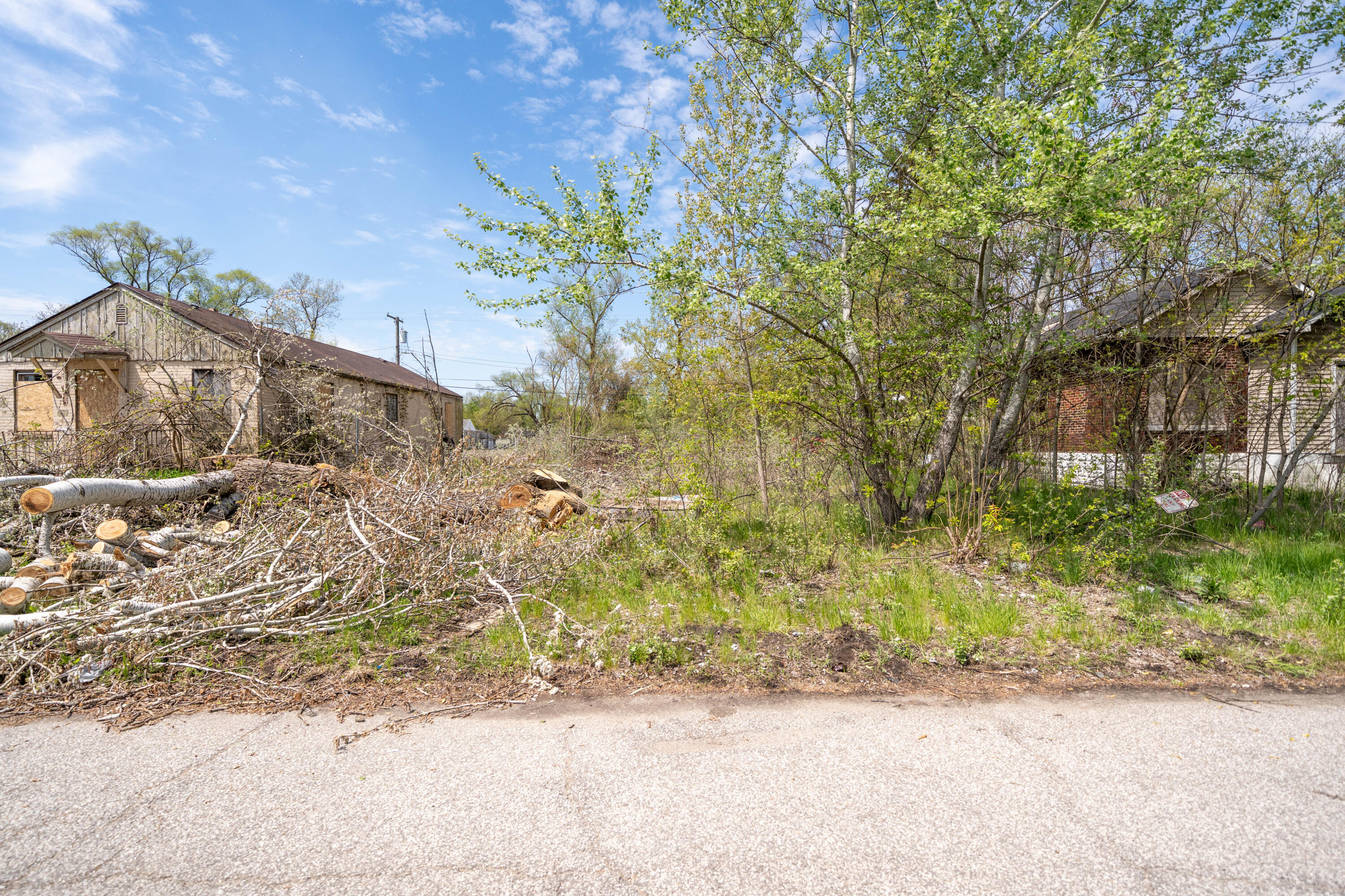2668 Madison Street Gary, IN 46407 - Photo 2 of 13 a front view of a house with a yard