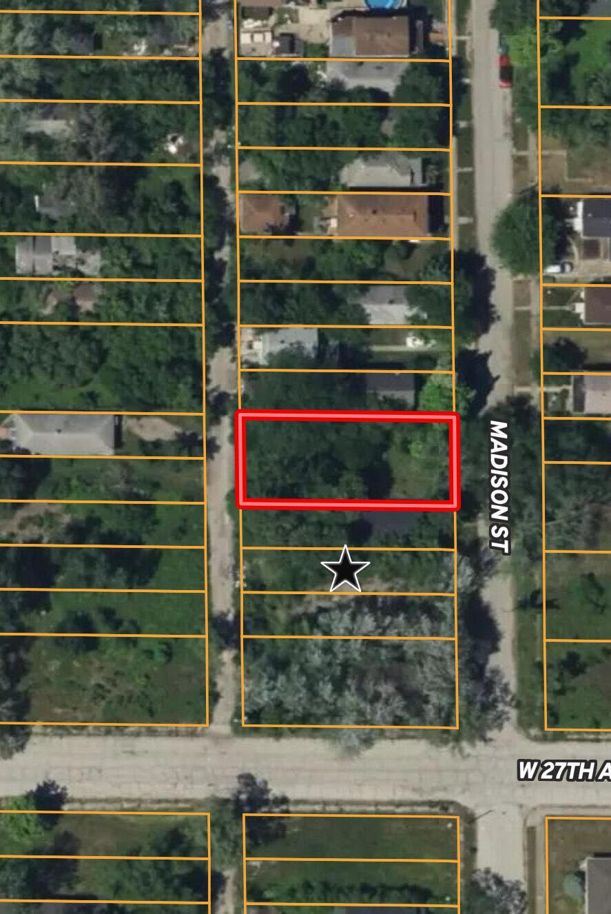 2668 Madison Street Gary, IN 46407 - Photo 3 of 13 a view of a wooden door and a window