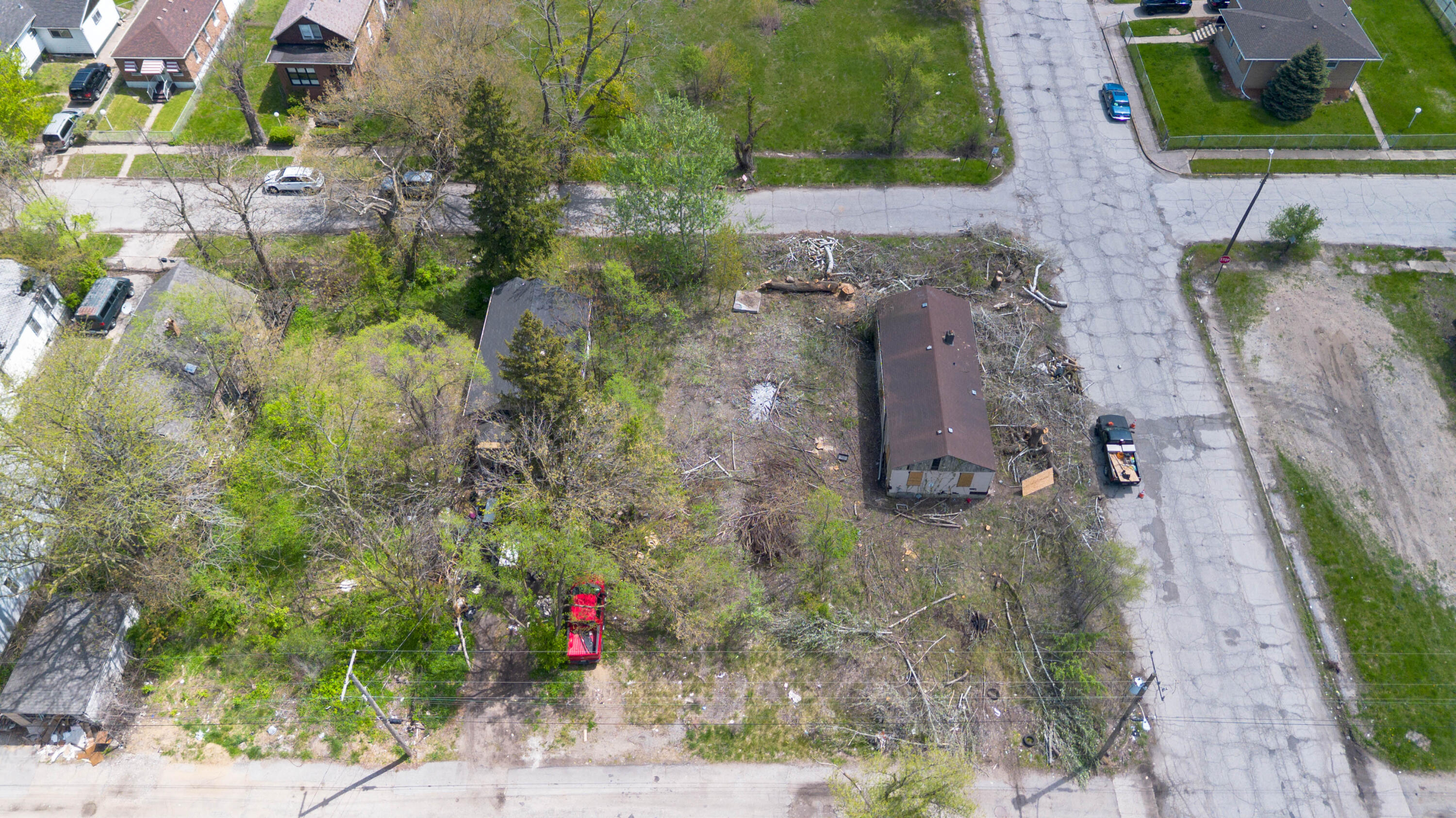 2668 Madison Street Gary, IN 46407 - Photo 8 of 13 an aerial view of a house with a yard and large tree