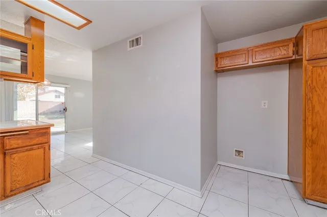 a view of a storage & utility room in a kitchen