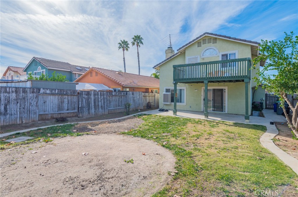 1955 Sierra Espadan Road Perris, CA 92571 - Photo 28 of 29 a front view of a house with garden