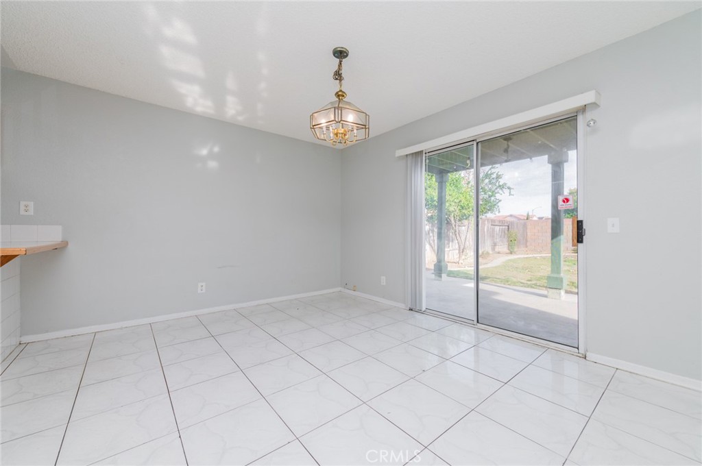 1955 Sierra Espadan Road Perris, CA 92571 - Photo 6 of 29 an empty room with windows