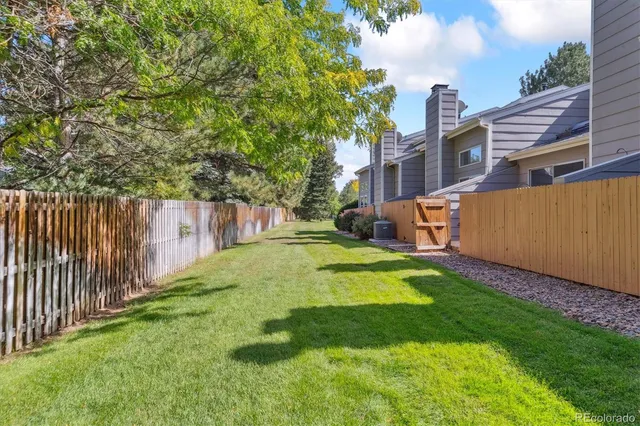 a view of a backyard with a house