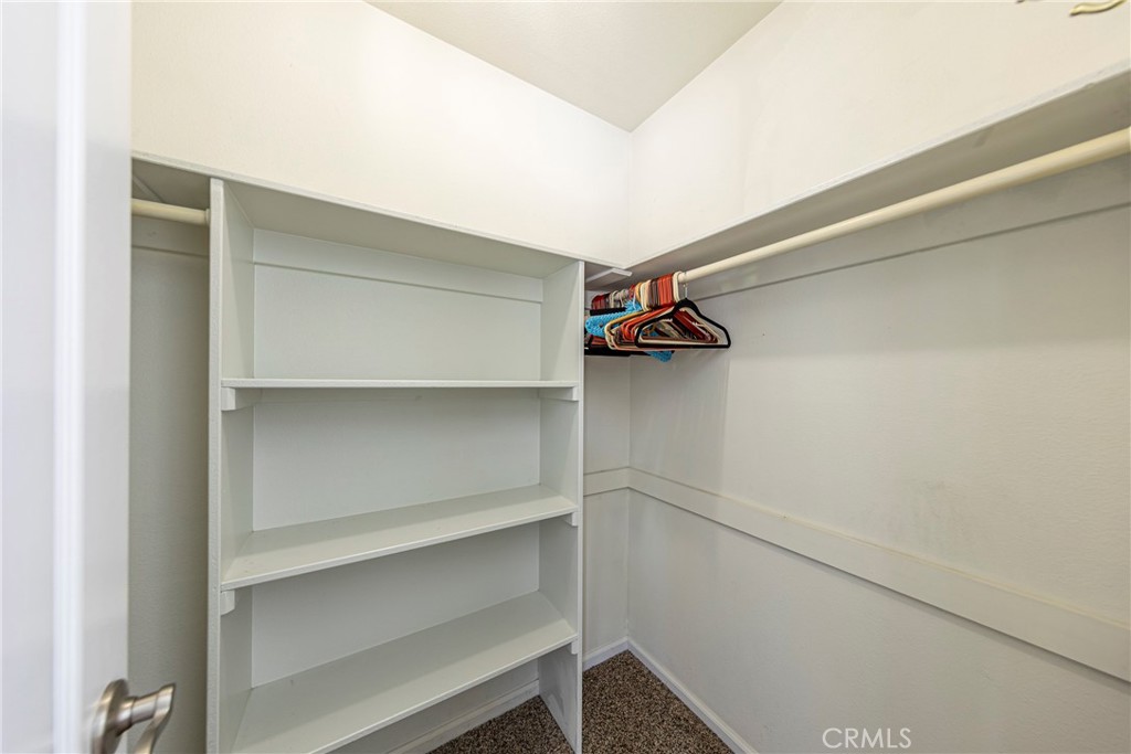 41715 River Falls Road Oakhurst, CA 93644 - Photo 39 of 65 a view of walk in closet with empty racks