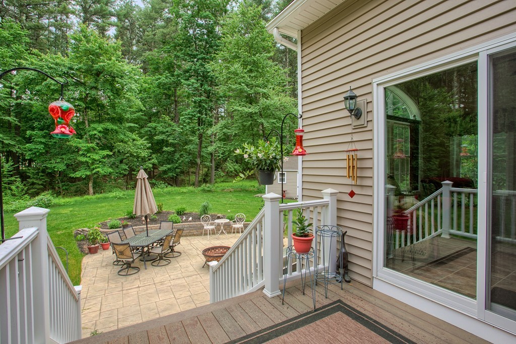 264 Westford Road Tyngsborough, MA 01879 - Photo 24 of 27 a view of a deck with a backyard