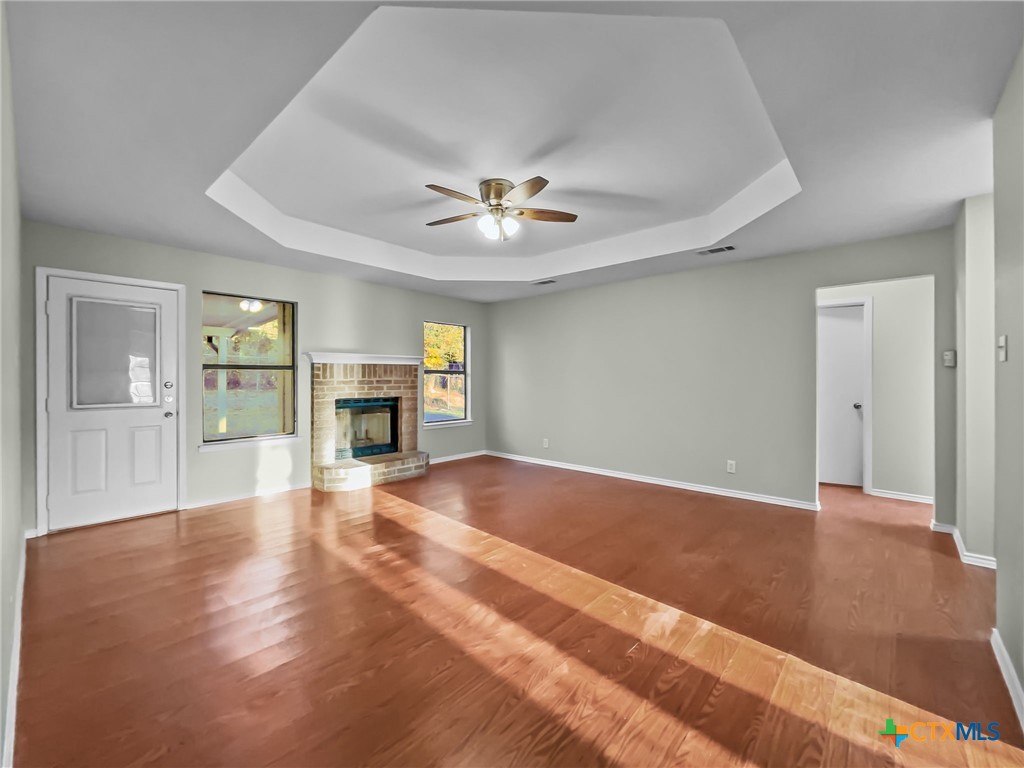 5009 Ridge Haven Drive Killeen, TX 76543 - Photo 2 of 16 a view of an empty room with window and a kitchen