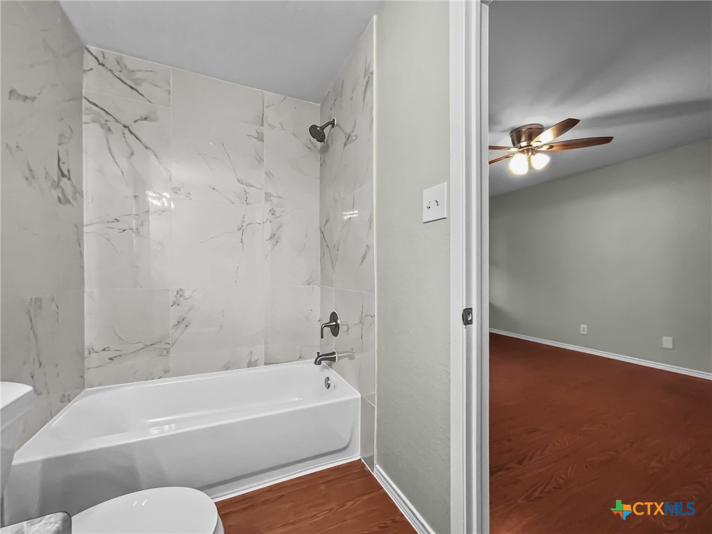 5009 Ridge Haven Drive Killeen, TX 76543 - Photo 8 of 16 a bathroom with a bathtub and a shower