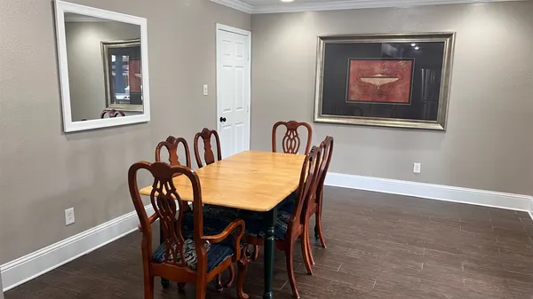 a view of a dining room with furniture
