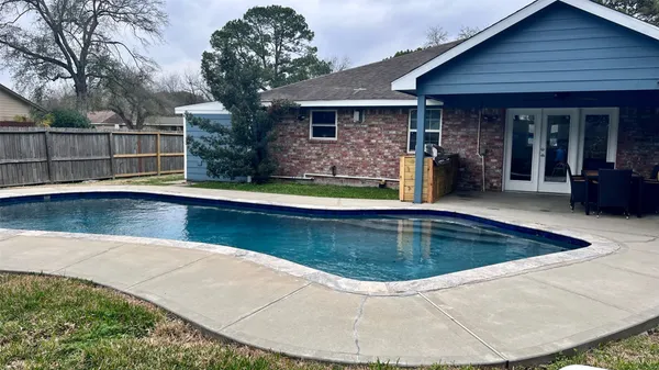 a view of a house with swimming pool