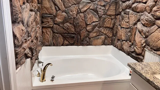 a bathroom with a bathtub