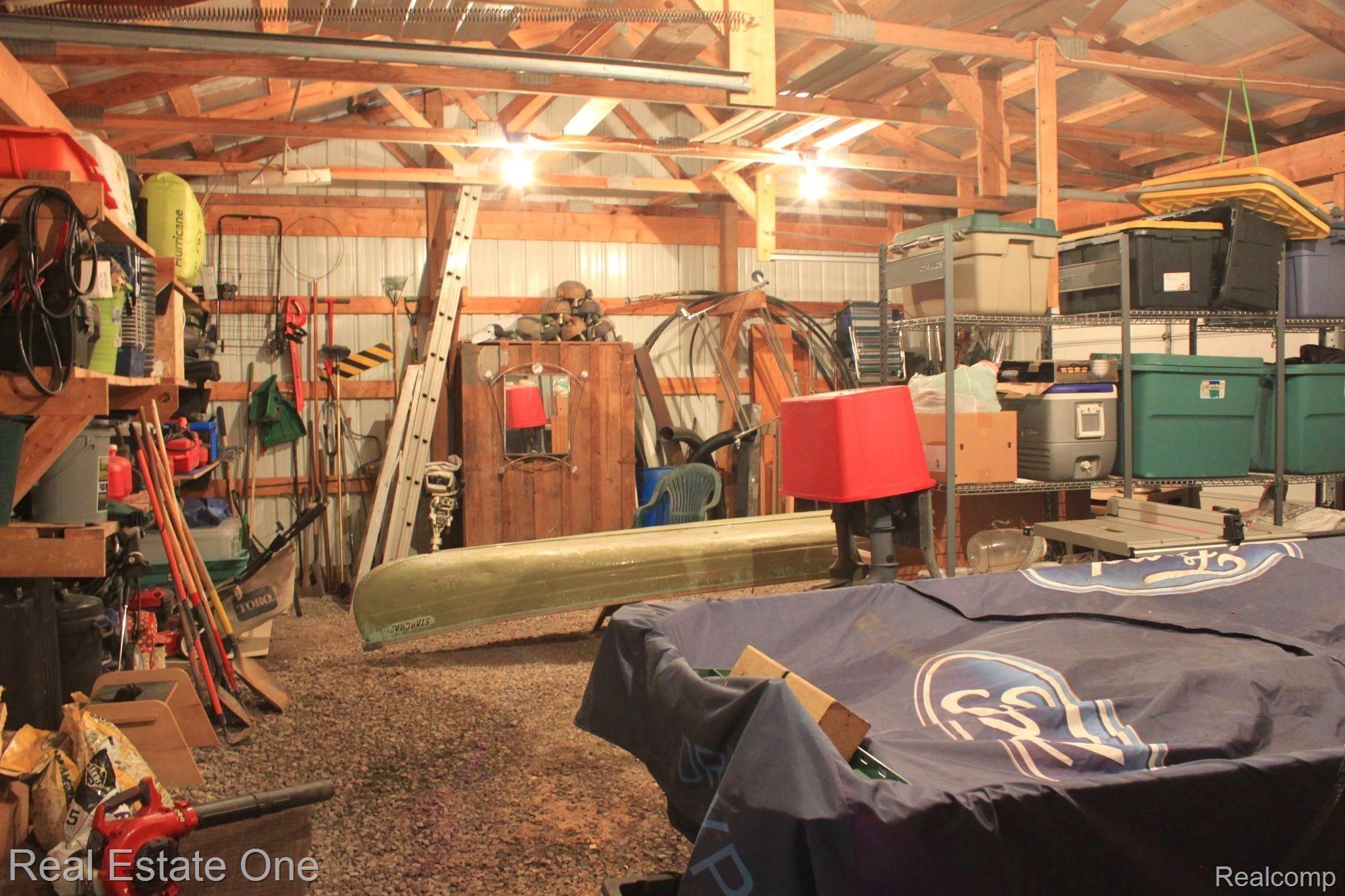 5475 North Cedar River Road Gladwin, MI 48624 - Photo 55 of 64 pole barn interior 1.JPG