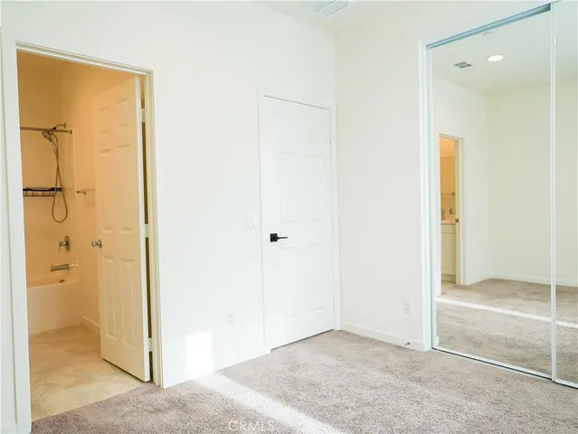 a view of a bathroom with a glass door