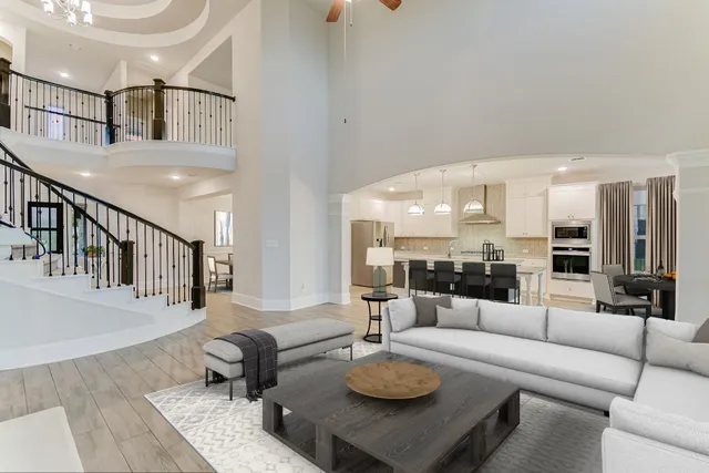 a living room with furniture and a table