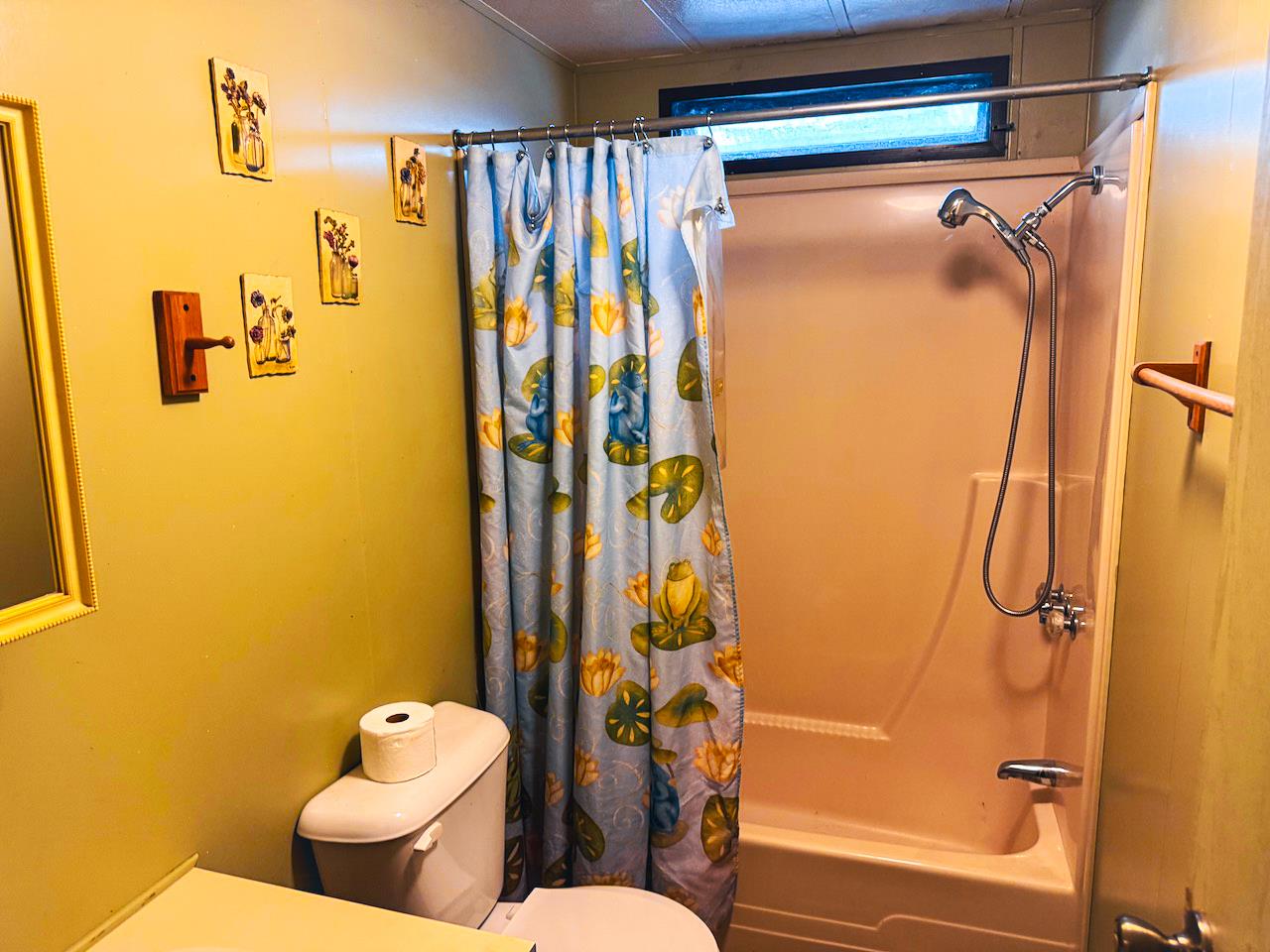 314 South Main Street, Unit 187 Angels Camp, CA 95222 - Photo 16 of 27 a bathroom with a shower toilet and sink