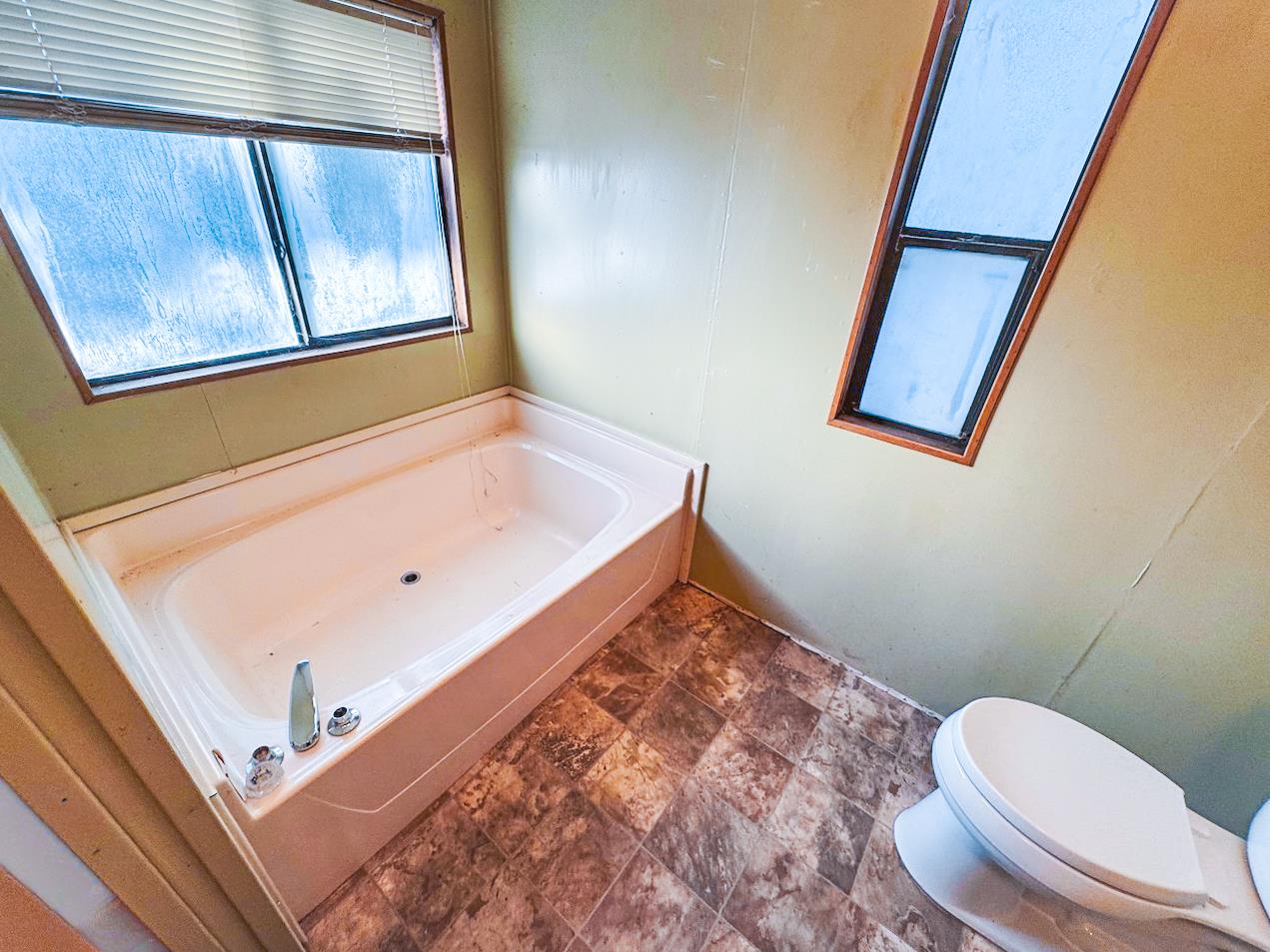 314 South Main Street, Unit 187 Angels Camp, CA 95222 - Photo 17 of 27 a bathroom with a toilet and a shower