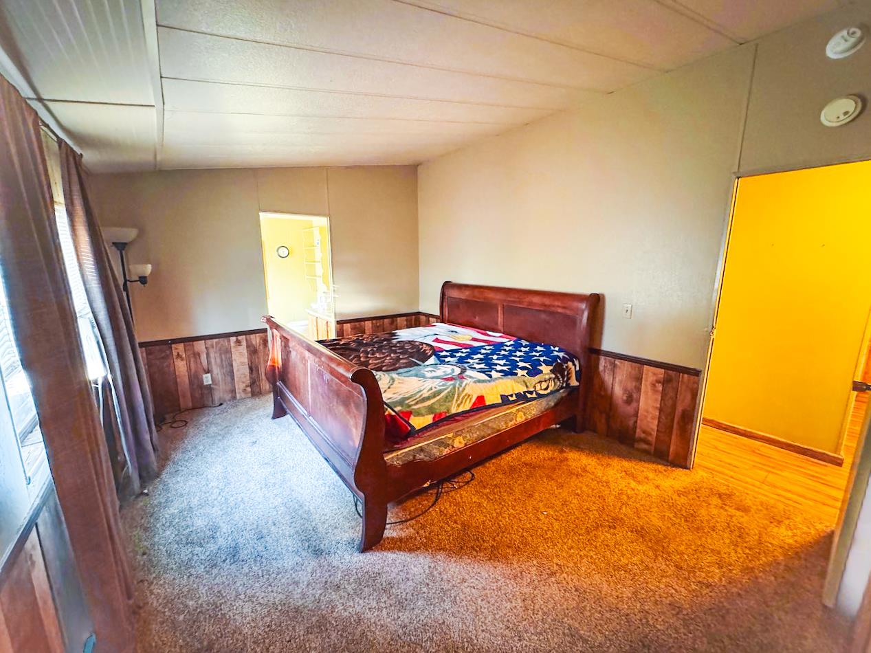 314 South Main Street, Unit 187 Angels Camp, CA 95222 - Photo 19 of 27 a bedroom with a bed and a window