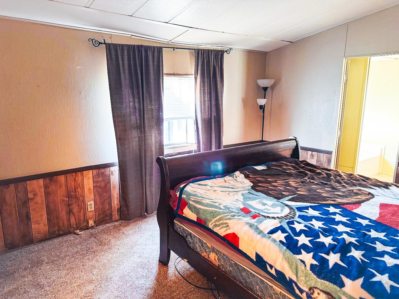 314 South Main Street, Unit 187 Angels Camp, CA 95222 - Photo 20 of 27 a bedroom with a bed and a window