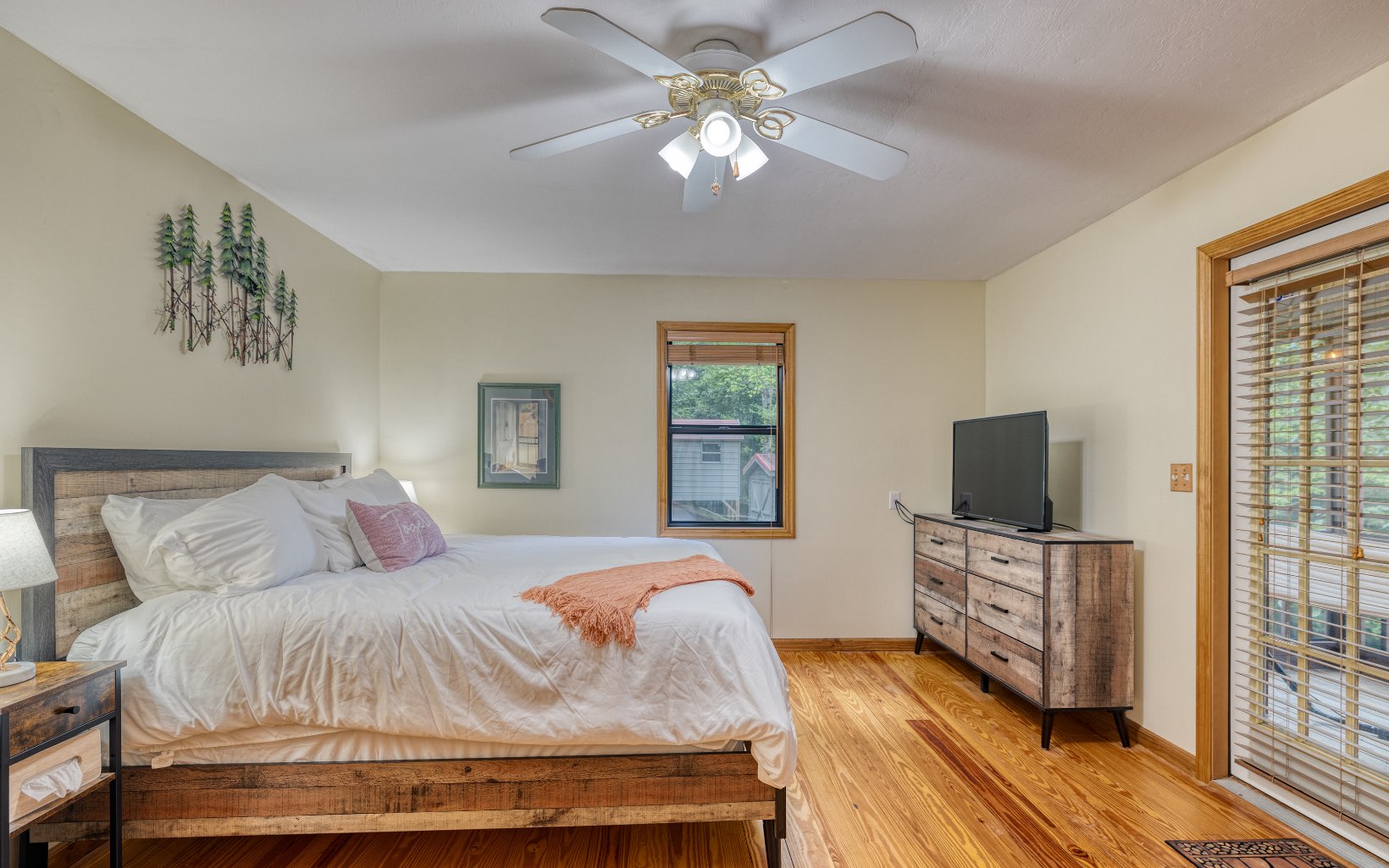 271 Rolling Hill Morganton, GA 30560 - Photo 26 of 69 a bedroom with a bed and a flat screen tv