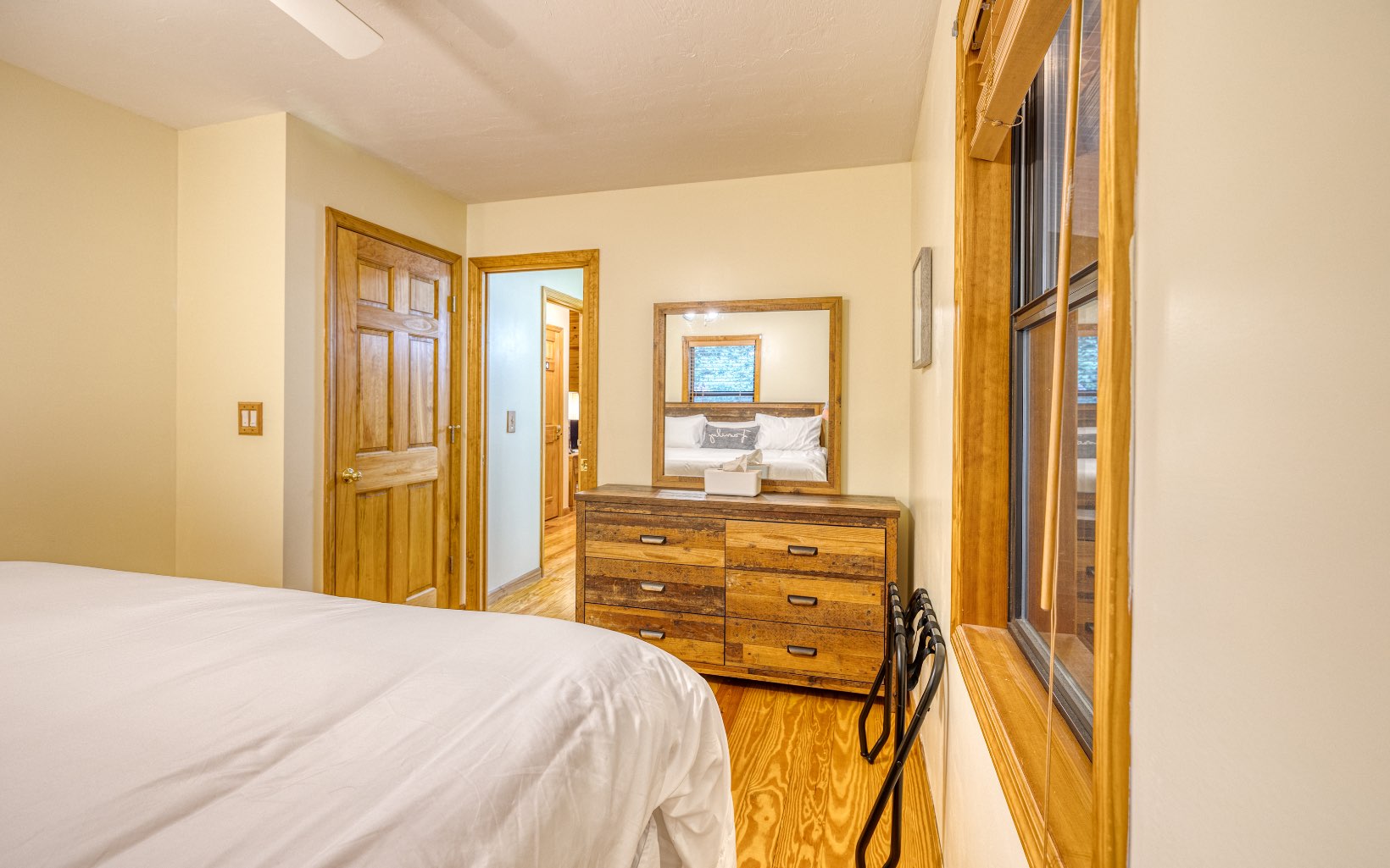 271 Rolling Hill Morganton, GA 30560 - Photo 32 of 69 a bedroom with a bed and a mirror