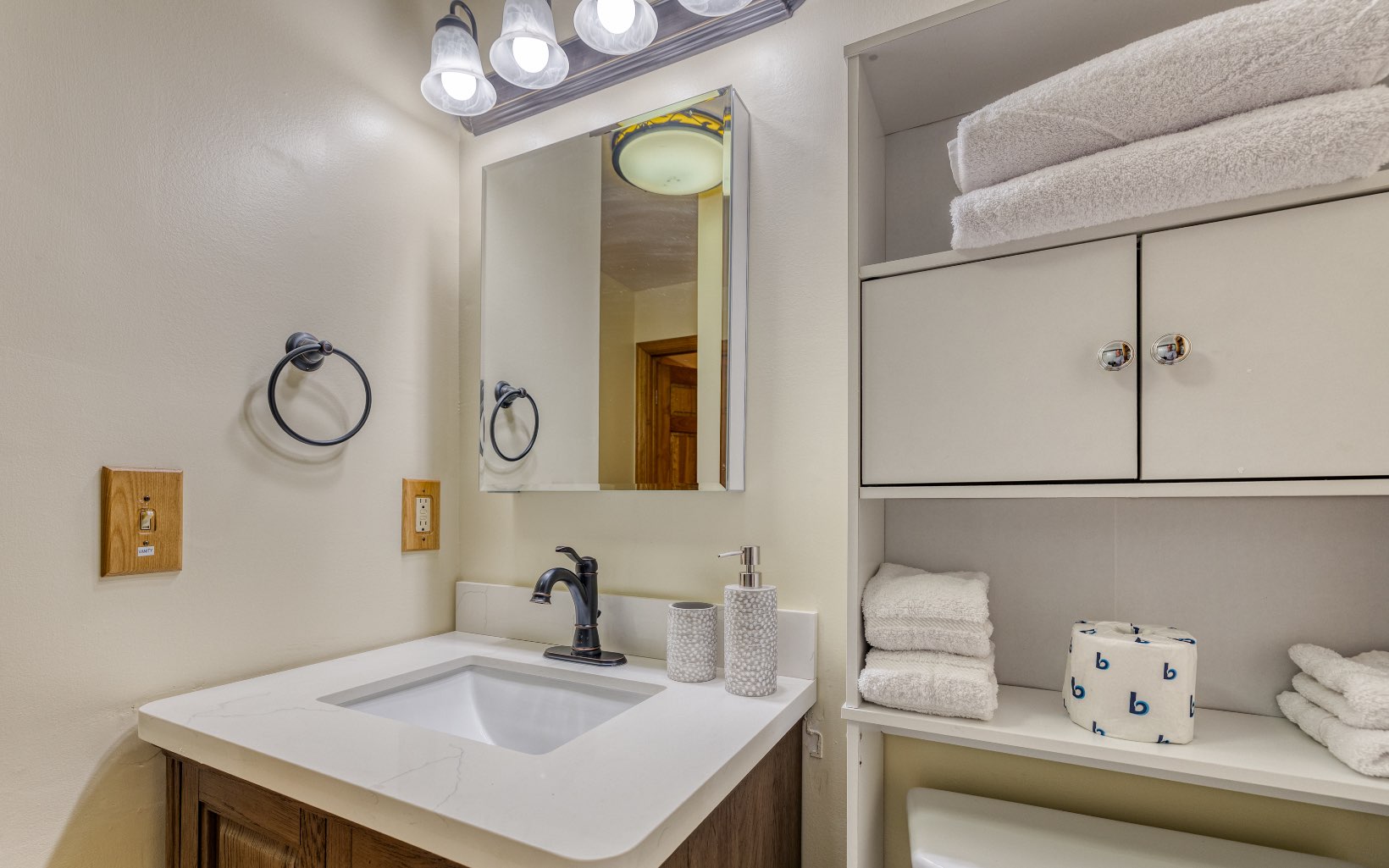 271 Rolling Hill Morganton, GA 30560 - Photo 33 of 69 a bathroom with a sink and a mirror