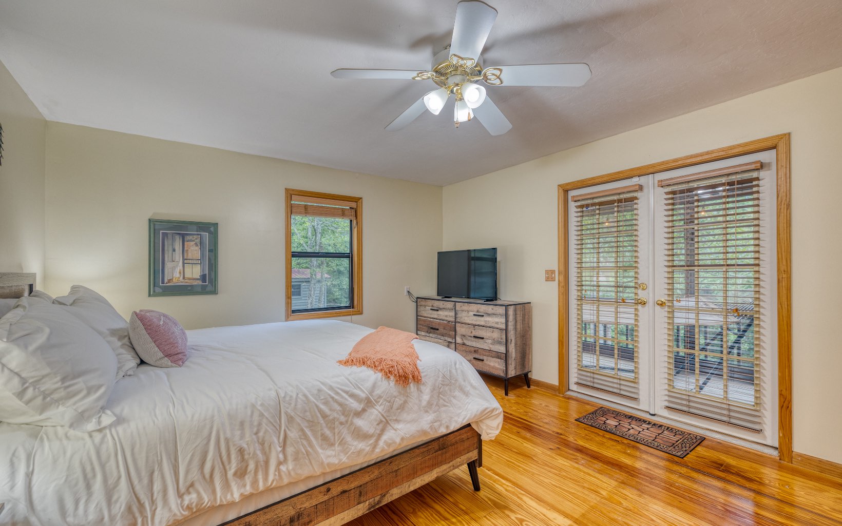 271 Rolling Hill Morganton, GA 30560 - Photo 5 of 69 a bedroom with a bed and a flat screen tv