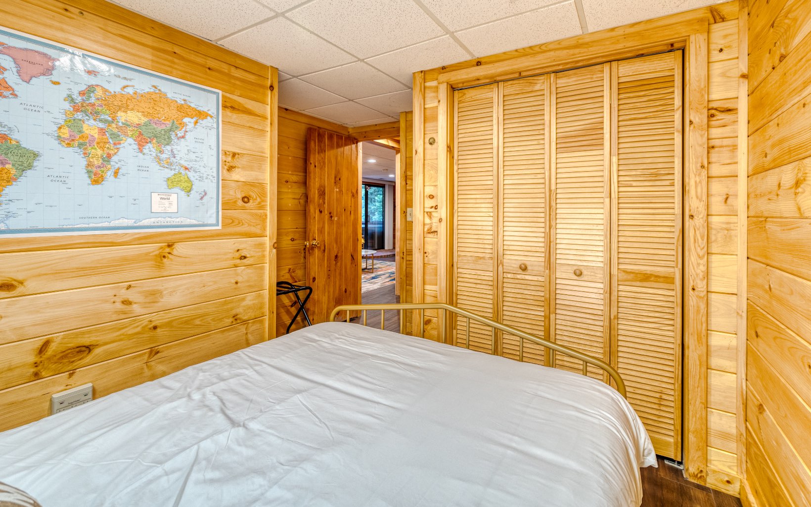 271 Rolling Hill Morganton, GA 30560 - Photo 52 of 69 a bedroom with a bed and a painting on the wall